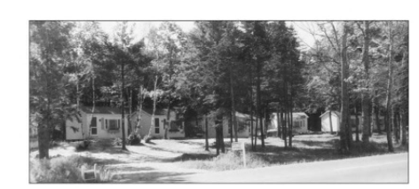 Photo of cabins at Wiscasset Woods Lodge circa 1935. Our hotel has been welcoming guests to Maine for over 100 years.